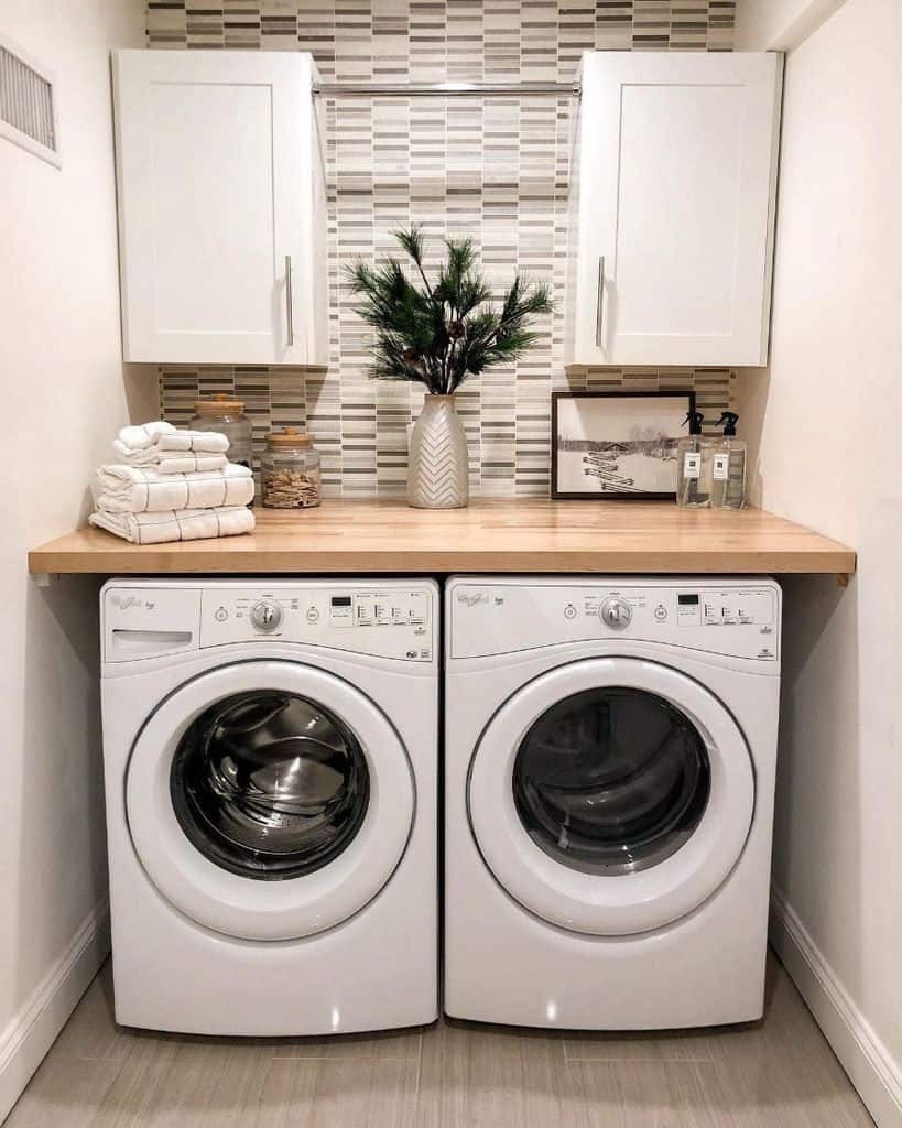 small laundry room wall cabinets side by side washer and dryer