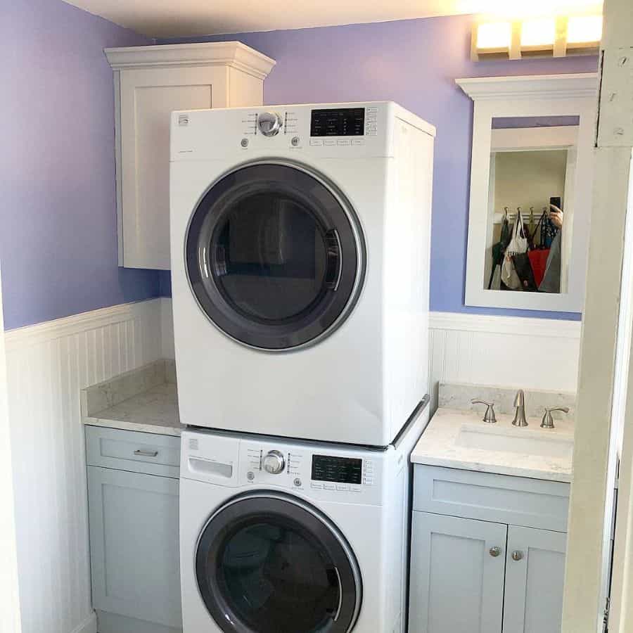 two tone purple and white wall laundry stacked washer and dryer