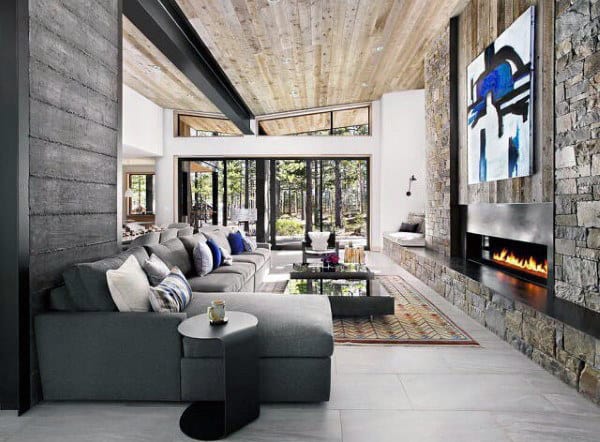 large living room with gray sofa and fire place