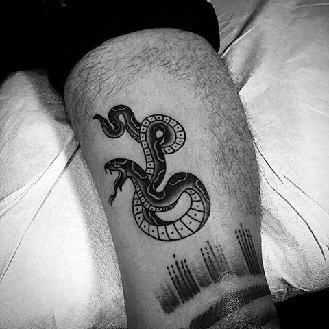 Small Male Curled Snake Tattoo
