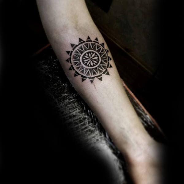 Small Male Inner Forearm Tribal Sun Tattoo Design Inspiration