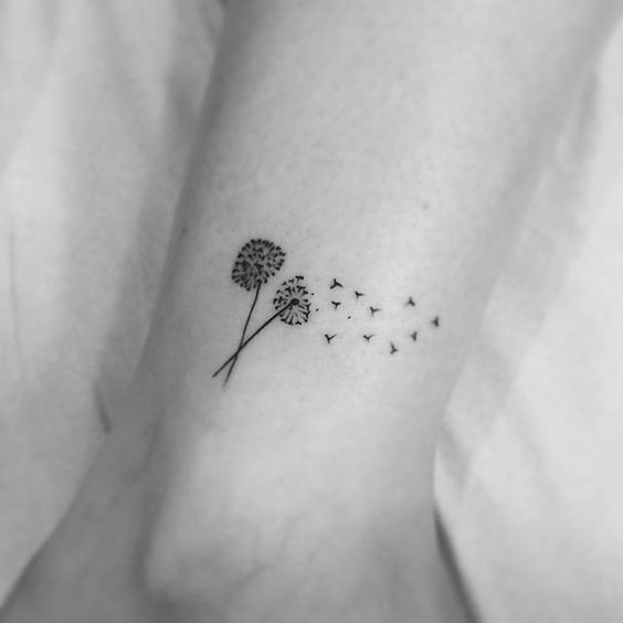 small meaningful dandelion tattoo