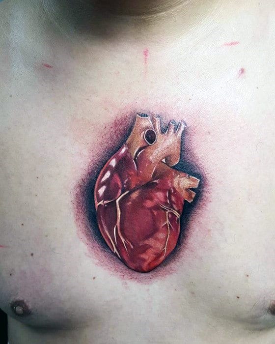 Small Mens Anatomical Heart Center Of Chest Tattoo Designs