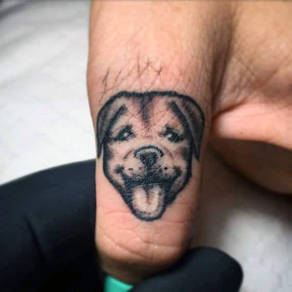 Small Mens Dog Tattoo On Finger