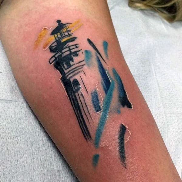 Small Mens Watercolor Lighthouse Tattoo In Blue And Yello Ink