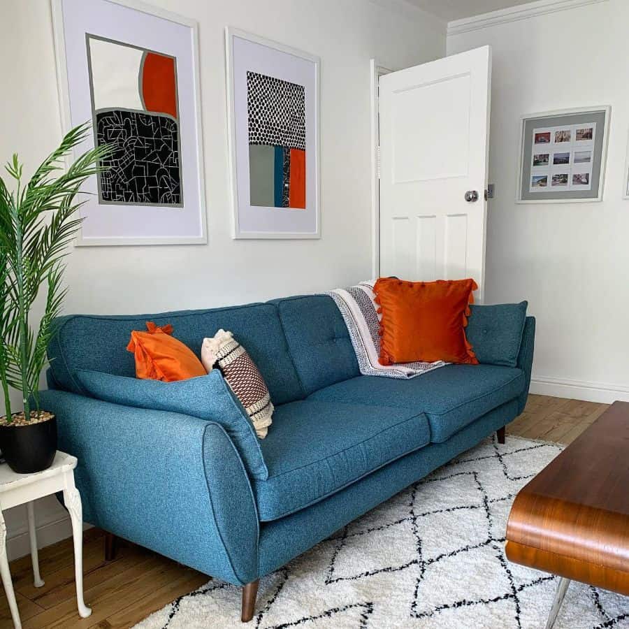 blue sofa in mid-century living room 