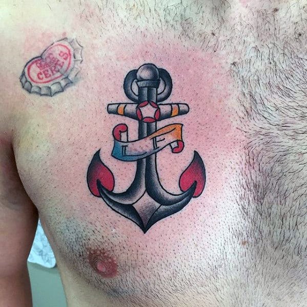 small old school traditional mens anchor tattoo on upper chest