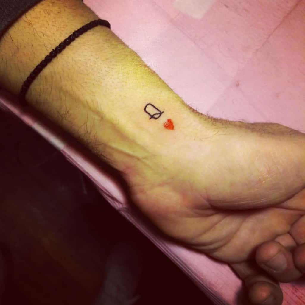 Queen of hearts tattoo delicate red on outer wrist   Queen of hearts  tattoo Cool wrist tattoos Wrist tattoos for guys