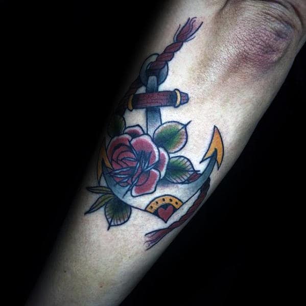 small rose flower with anchor guys traditional outer forearm tattoo