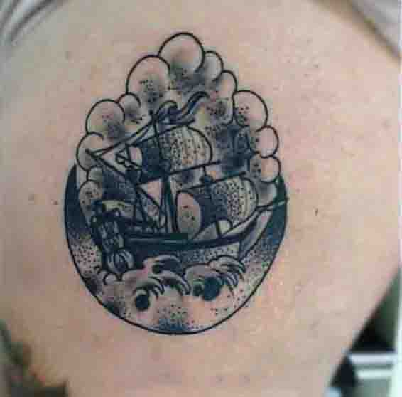 Small Sailing Ship Moon Tattoo Design On Back For Guys