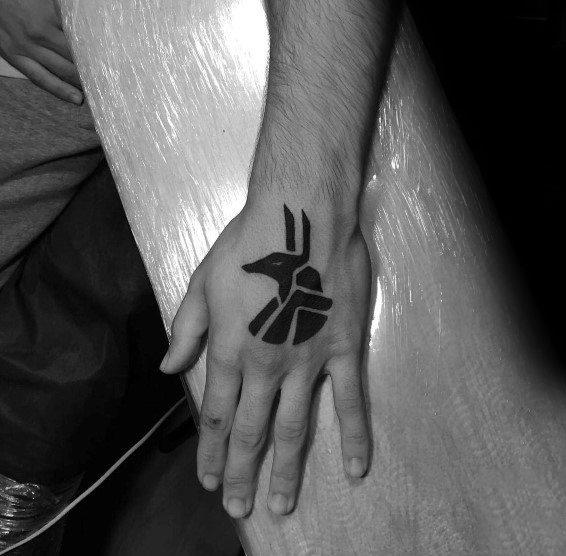 Small Simple Black Ink Anubis Mens Hand Tattoos