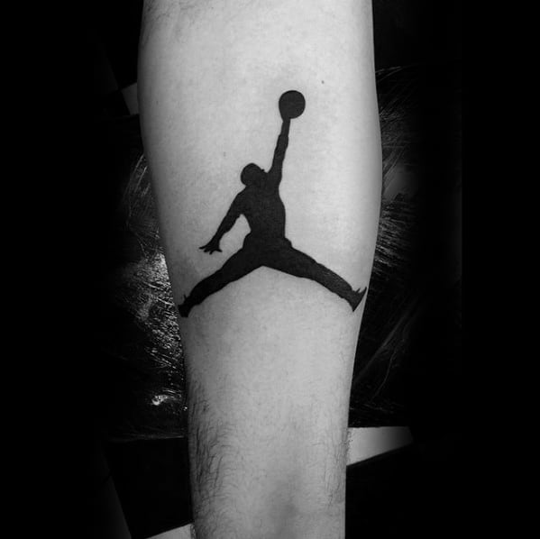 Small Simple Guys Black Ink Tattoo Of Jordan Symbol On Forearm