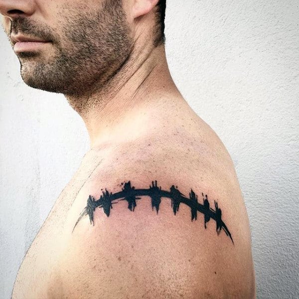 Small Simple Guys Football Shoulder Tattoo