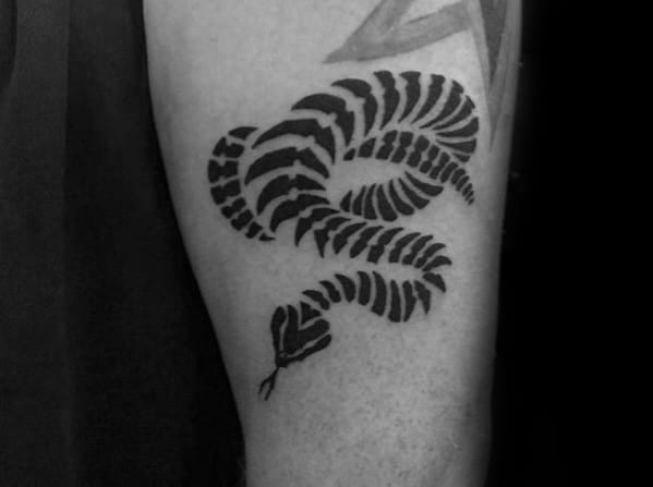 Small Simple Guys Tribal Snake Black Ink Tattoo On Arm