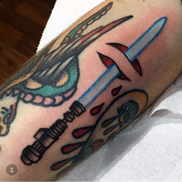 Small Simple Lightsaber Ripped Skin Mens Arm Tattoo