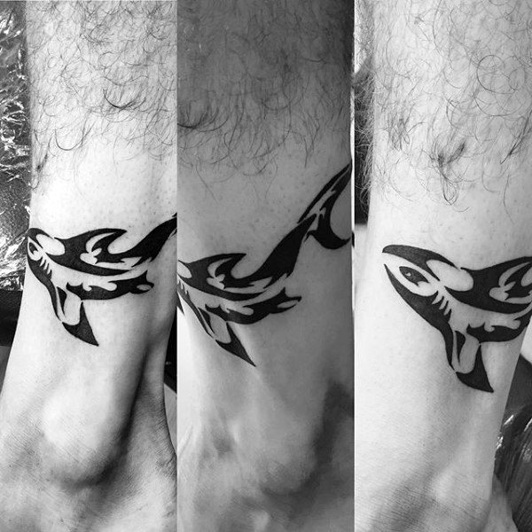 Small Simple Lower Leg Shark Tribal Tattoo On Gentleman