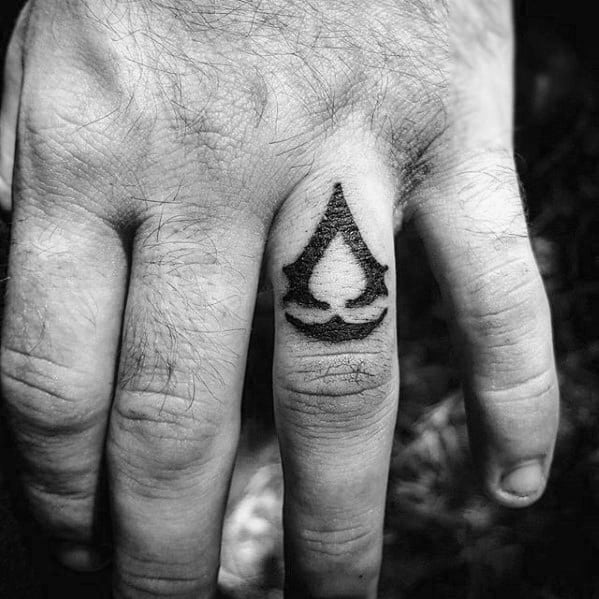 Small Simple Mens Assassins Creed Finger Tattoo