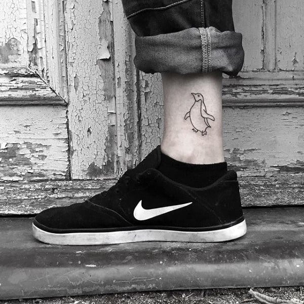 Small Simple Mens Black Ink Outline Penguin Lower Leg Tattoo