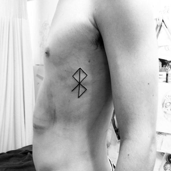Small Simple Symbolized Peace Sign Mens Ribs Tattoo