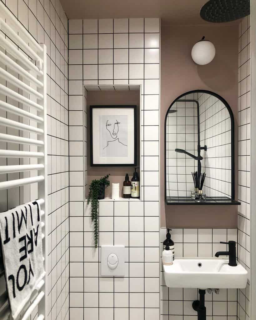 modern bathroom white tiles black finishings 