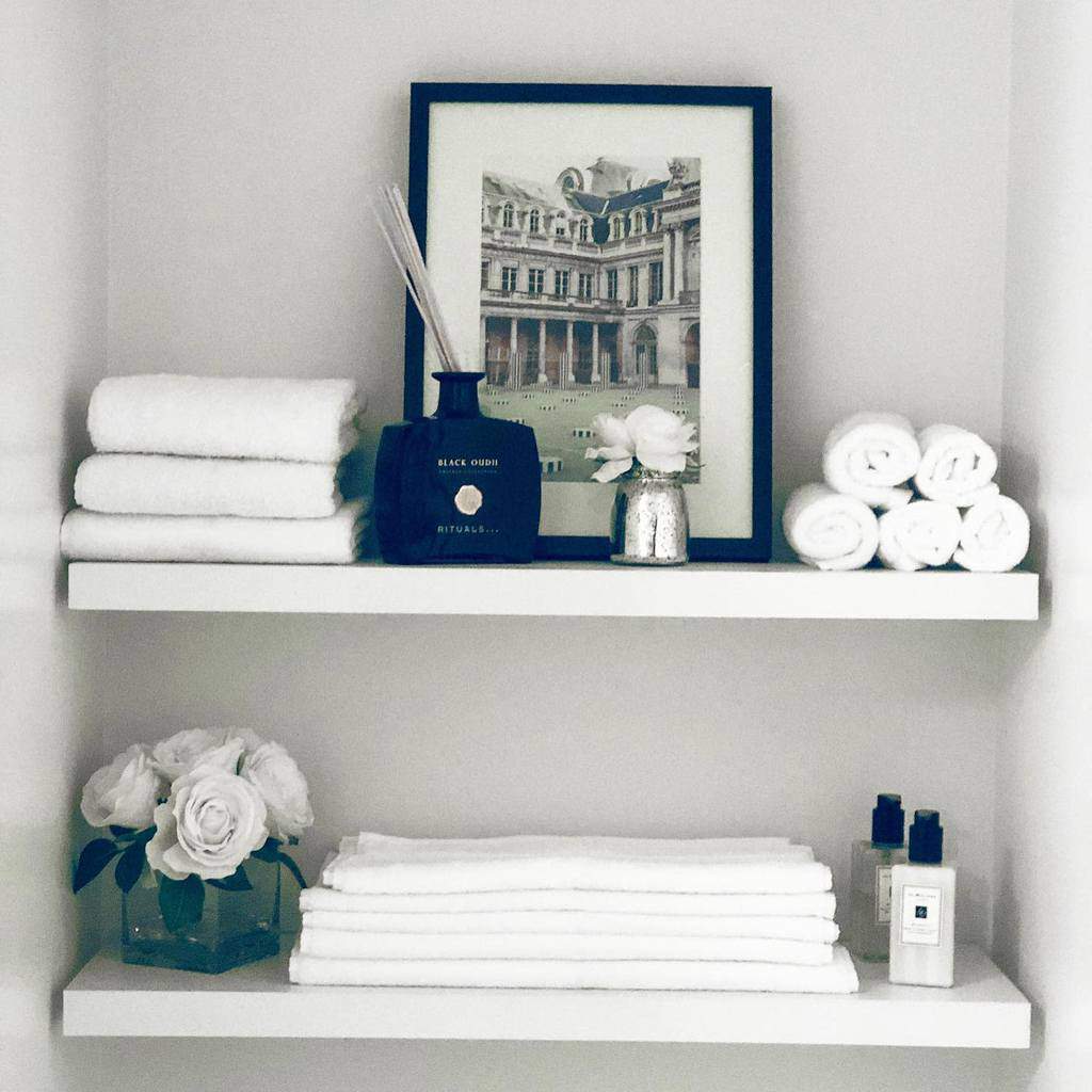 small wall bathroom shelves with towels 