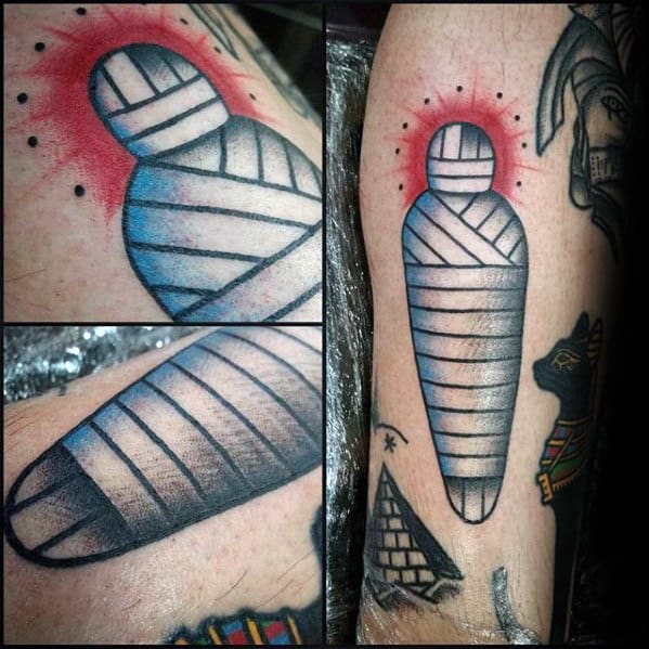 Small White Ink Mens Glowing Mummy Leg Tattoo