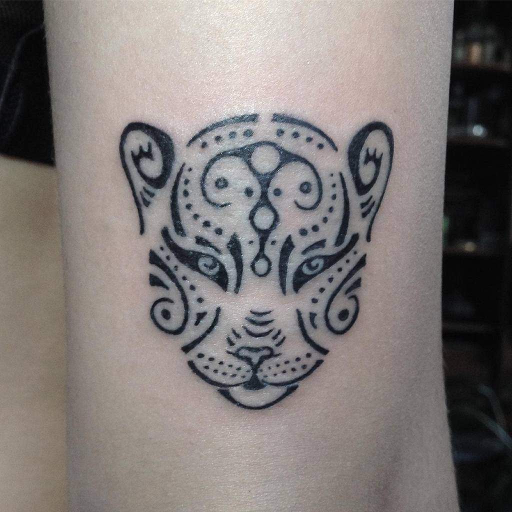 small-wing-tribal-lettering-jaguar-tattoo-brokenchainstattoo