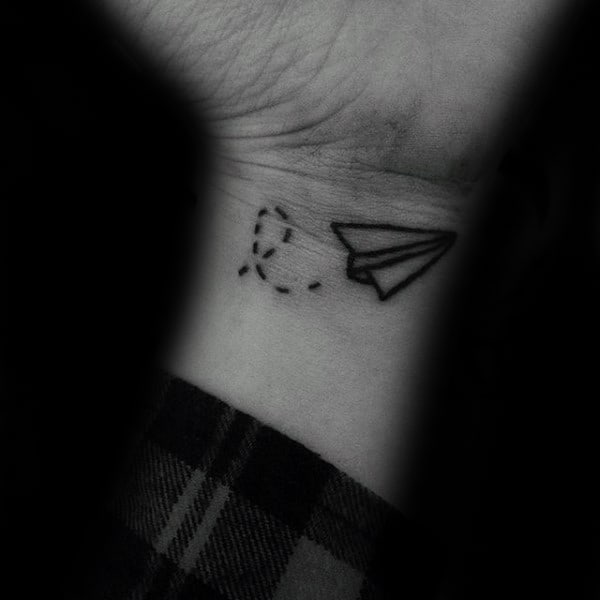 Small Wrist Flying Paper Airplane With Trail Of Dots Tattoos For Guys
