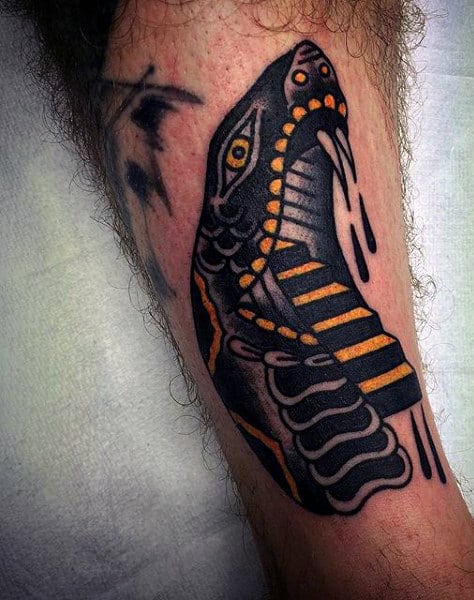 Snake Tattoo On Man's Arm Bicep