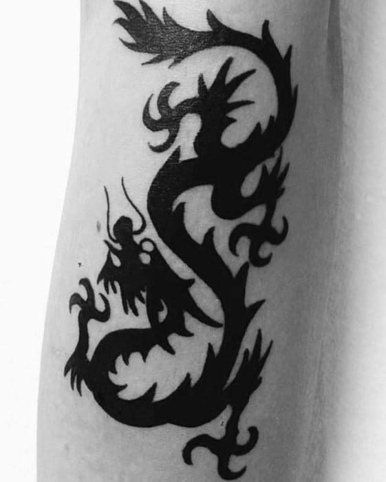 Solid Black Ink Forearm Masculine Simple Dragon Tattoos For Men