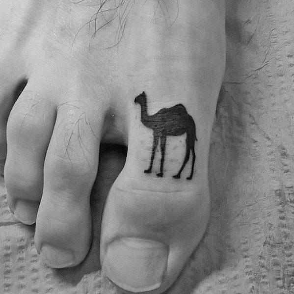 Solid Black Ink Guys Camel Tattoo On Toe Of Foot.