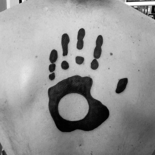 Solid Black Ink Guys Handprint Back Tattoo Ideas