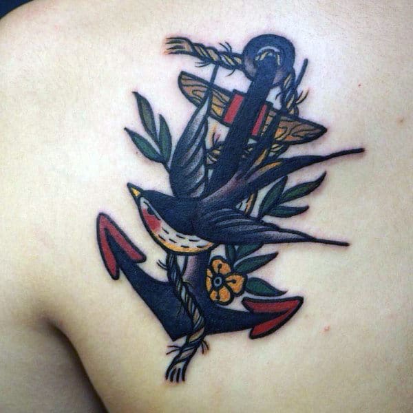 Sparrow With Anchor Mens Traditional Upper Back Tattoos