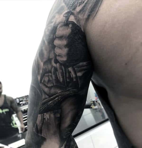 Spike Through Jesus Hand Arm Tattoos For Men