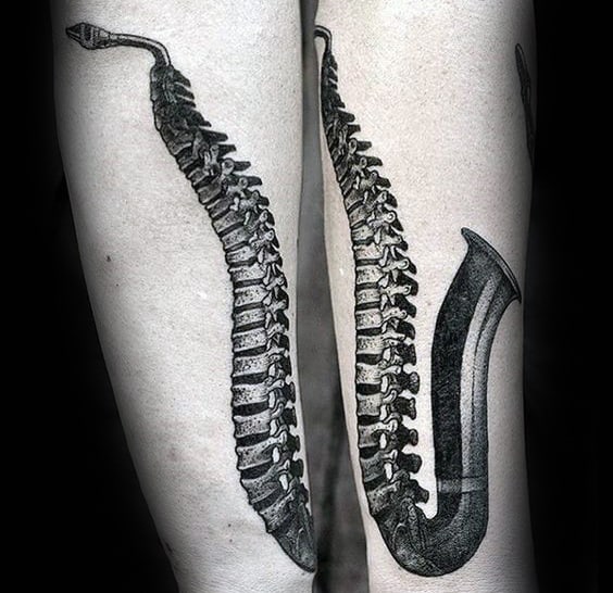 Spine Bones With Saxophone Mens Abstract Forearm Tattoo
