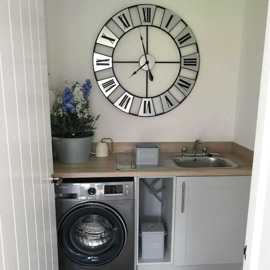 large wall clock in small laundry 