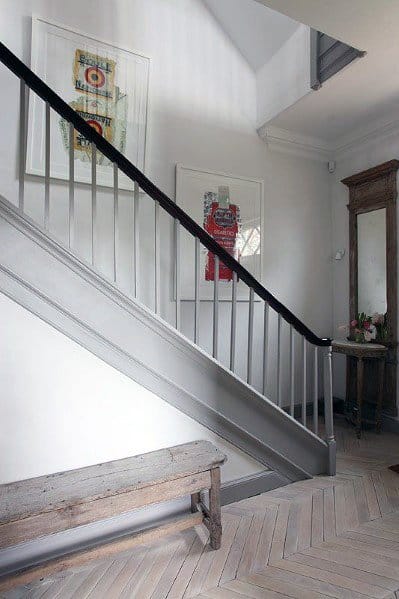 gray stair trim modern home with bench