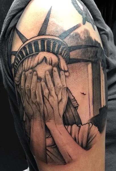 Statue Of Liberty Hands Over Face Tattoo On Arm