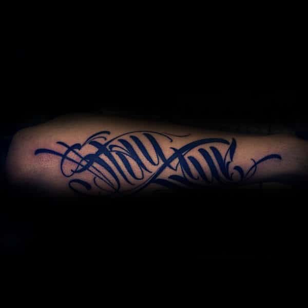 Stay True Script Tattoo On Males Outer Forearm