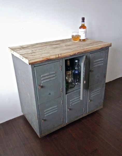 Industrial mini bar with a steel locker base and rustic wood top for a unique look.