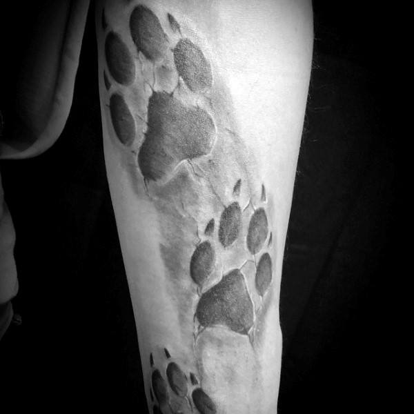 Stone Dog Paw Prints Mens Forearm Tattoo Ideas