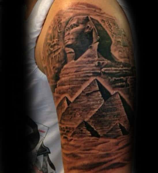 Egyptian pyramids on the right inner forearm