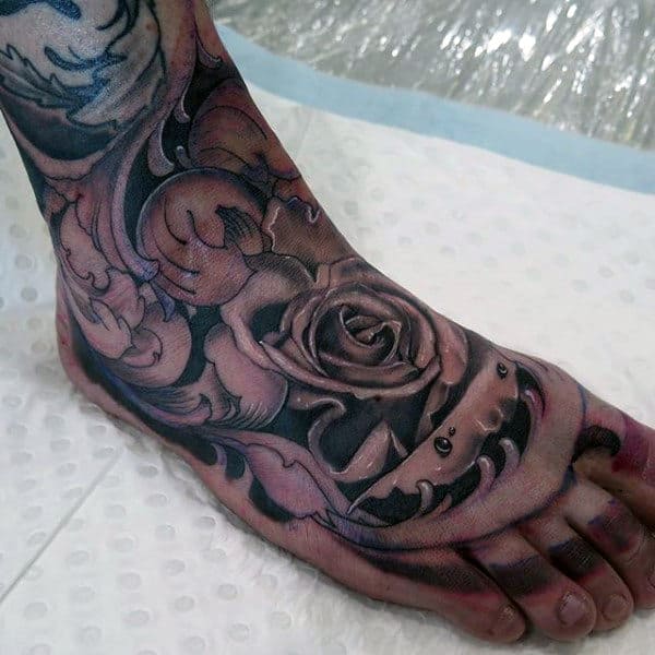 Striking Rose Tattoo On Foot For Males