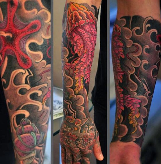 Stunning Black Red Coral And Jellyfish Tattoo Male Forearms