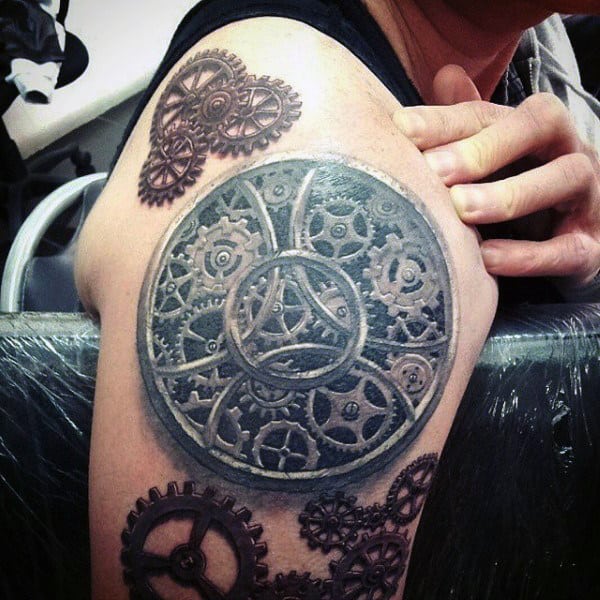 Stunning Steampunk Wheel Tattoo Male Arms