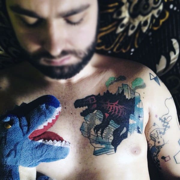 Stylish Godzilla Dinosaur Skeleton Tattoo On Mans Chest