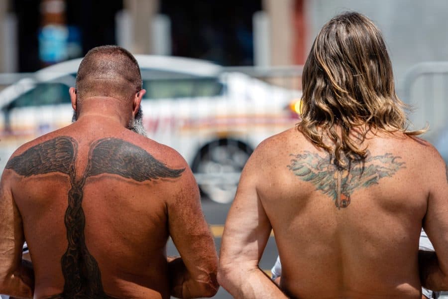 Sunburned Guys Tattooed Skin