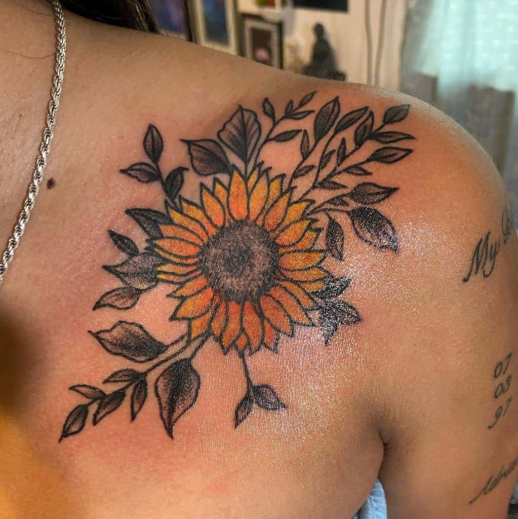 sunflower flower shoulder tattoo b.a.d._tattoos