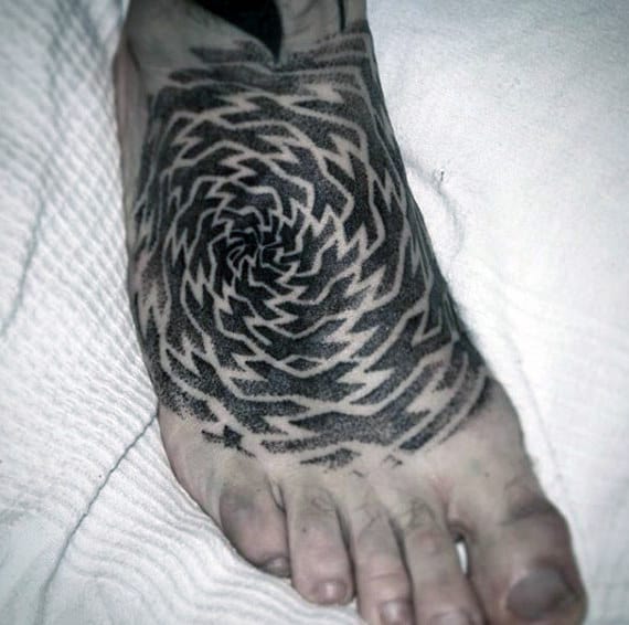 Superb Black Swirly Designs Tattoo On Foot For Guys