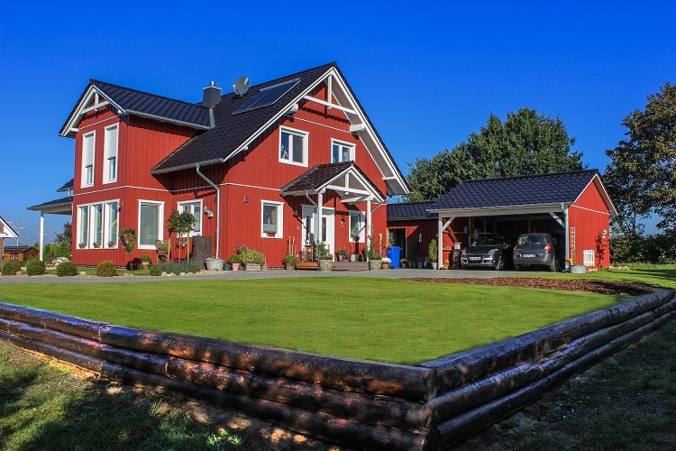 swedish red carriage house carport